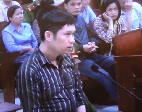 Nguyễn Mạnh Tường tại phiên xử ngày 14/4/2014.